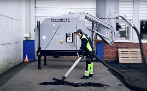 Industrielle støvsugere utendørs samler selv de minste partiklene.
