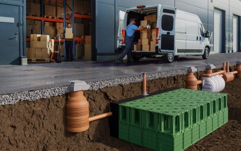 Outside of Logistics Warehouse with Open Door, Delivery Van Loaded with Cardboard Boxes. Truck Delivering Online Orders, Purchases, E-Commerce Goods, Wholesale Merchandise.