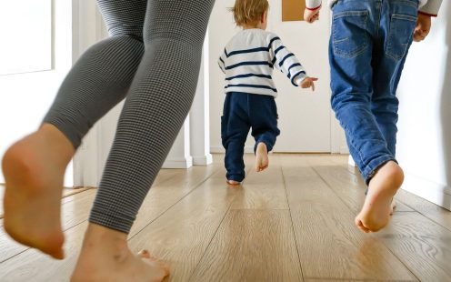 Family running in their home