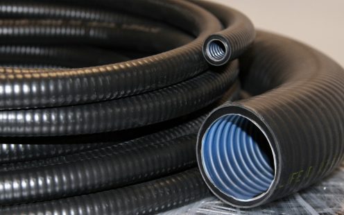 UV bestandig pansret PVC korrugert el-rør, med innvendig  lavfriksjonsbelegg, 1250N, Svart