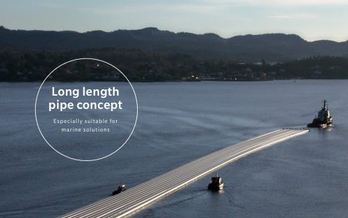 A boat tugging long length pipes